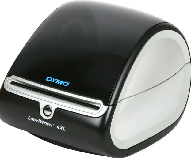 DYMO LabelWriter 4XL, a wide printer for 4 x 6 inch shipping labels, with a smoked black lid and silver sides