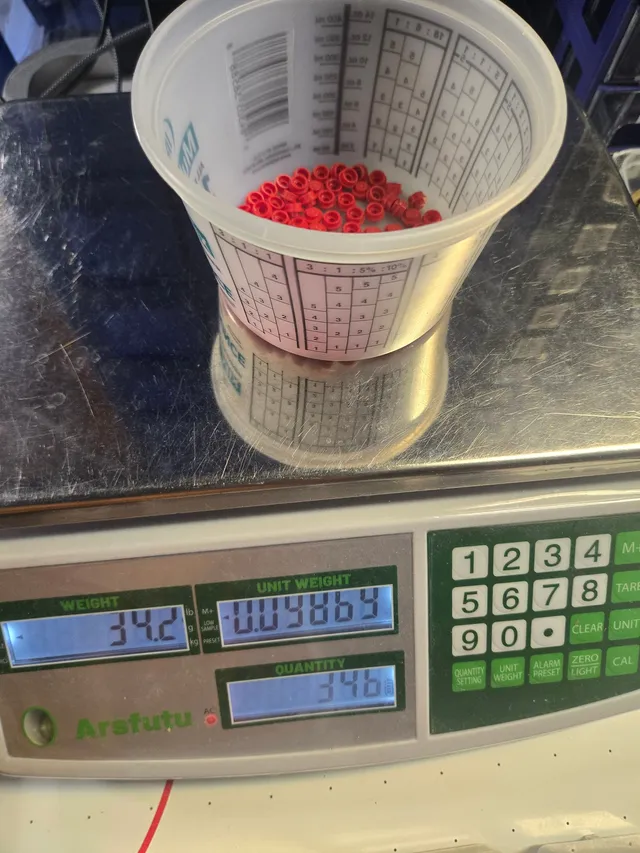 ARSFUTU counting scale weighing a cup of red round LEGO pieces, displays showing 34.2 g and a count of 346