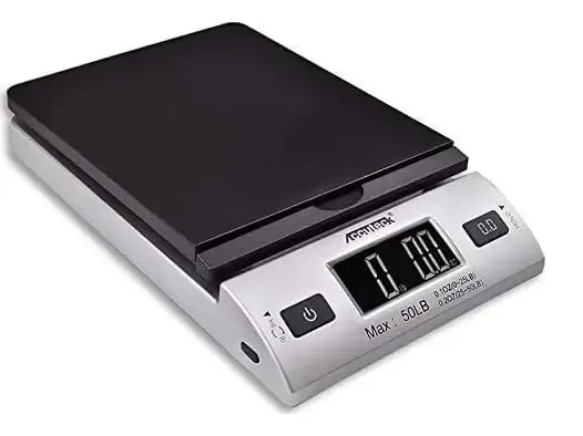 Silver ACCUTECK digital shipping scale with a flat black weighing platform and LCD display reading zero